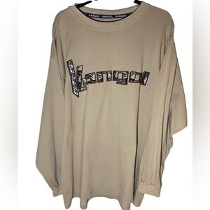 Kangol men’s long sleeve t-shirt with a camouflage-patterned logo on the chest.